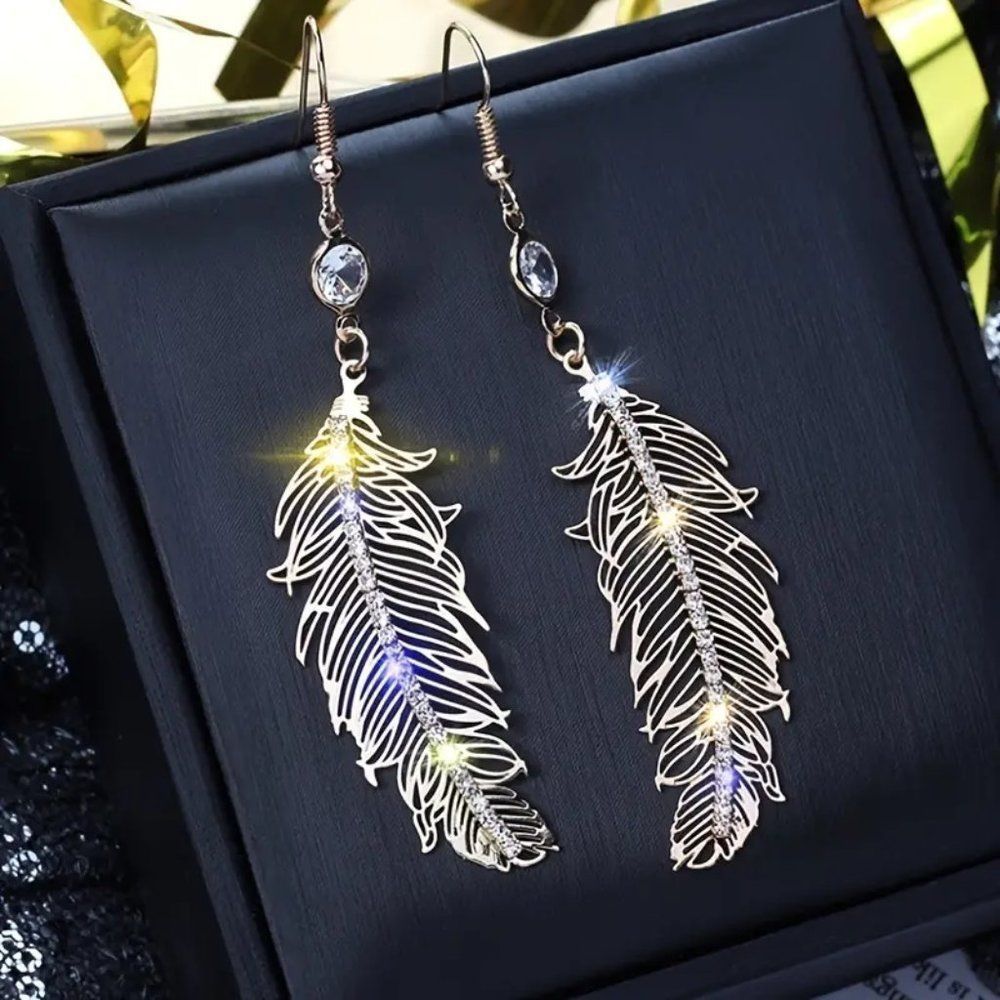 Gorgeous Dangle Silver Feather Earrings Bling